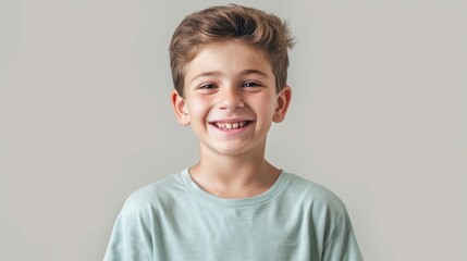 The smiling young boy