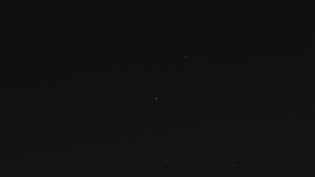 4K Time lapse shot of Moon in the sky during the night as seen from Naggar near Manali in Himachal Pradesh, India. Night Lapse shot of moonset along with stars in the mountains. Natural background.