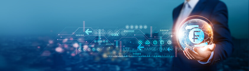 Businessman holds a global exchange-traded fund (ETF) with a network connected to international...