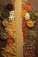 Uncooked various pasta overhead close up view.