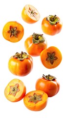 Fototapeta premium A Group of Whole and Sliced Persimmon Fruit Against a White Background