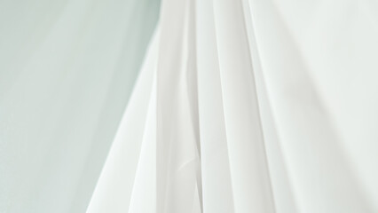 Obraz premium Elegant white fabric satin background, perfect for luxurious and smooth designs.