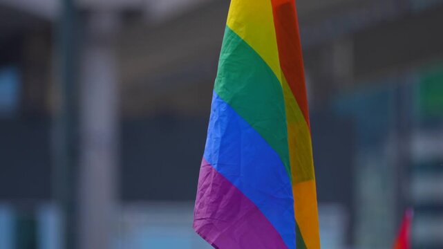 colorful rainbow colored flag at the parade