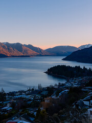 Sunset view of Queenstown city and Lake Wakatipu, New Zealand.