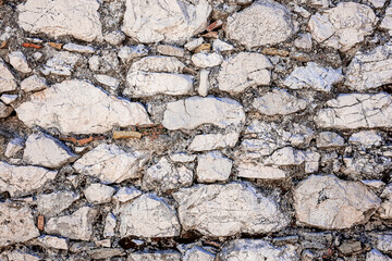 portion of surrounding wall built with stones and mortar
