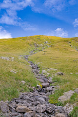 landscape with mountains sky and clouds