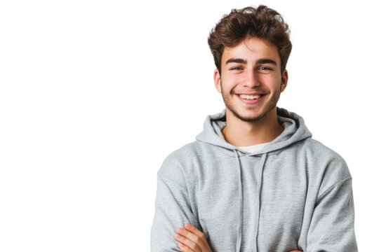 Smiling young man in casuals, standing confidently, isolated on white background