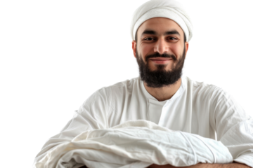 Proud Middle Eastern laundry owner with ironed clothes, isolated on white background