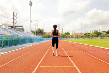 Fototapeta premium Active asian senior female health care outdoor exercise motion jogging running feet on synthetic treadmill : Health care concept.