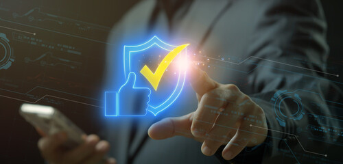 Reliability icon, support concept, call center and customer service. Business and technology concept. Businessman showing glowing neon line of reliability icon on virtual screen.