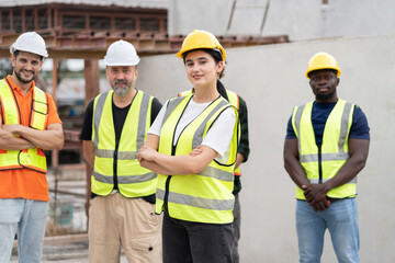 Portrait Hispanic Latin engineer woman with Multi-ethnic Team engineer or team labor at precast cement outdoor factory	