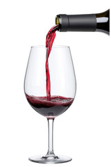 A glass being filled with red wine from a bottle against a white background, illustrating luxury, elegance, and the enjoyment of fine wine.
