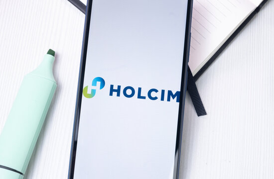 New York, USA - 1 August 2024: Holcim Group Logo on Phone Screen, Company Icon on Display
