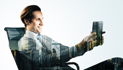 Businessman using a tablet with a cityscape overlay in the background.