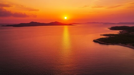 Fototapeta premium A mesmerizing sunset casts a warm, orange glow over the serene islands, showcasing the beauty of the Croatian coastline. The image symbolizes peace, tranquility, nature, beauty, and escape.