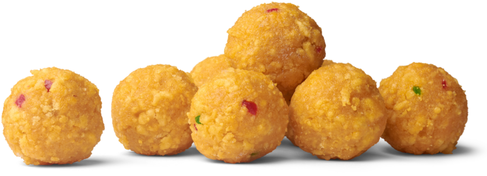 laddu, laddoo or ladoo isolated white background, popular traditional Indian sweet treats made during festivals, religious ceremonies and celebrations