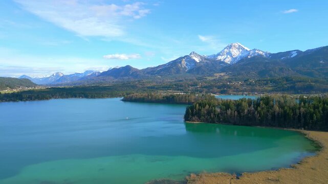 Flight over a fairytale lake with turquoise-blue water - travel photography