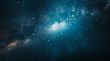 A breathtaking view of the night sky, filled with countless stars and a swirling nebula of gas and dust. The dark blue background is punctuated by twinkling white lights, creating a sense of wonder an