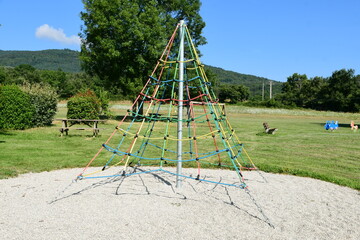 Fototapeta premium France, Roisey, Loire. Children's playground in summer.