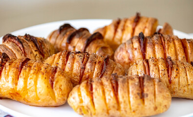 Swiss potatoes or baked rosti potatoes with calabrese sausage. Rustic potatoes