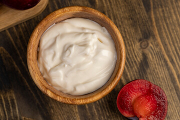 yogurt made from milk and red ripe plum