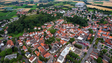 A panorama aerial view of the old town of Gudensberg in Germany, on a sunny day in early summer.