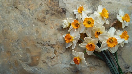 Spring daffodil bouquet on stone background © TheWaterMeloonProjec