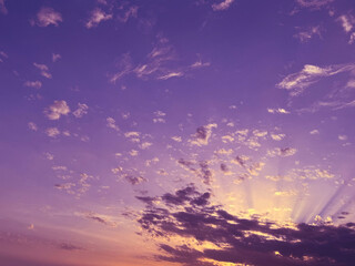 Purple sunset sky with clouds