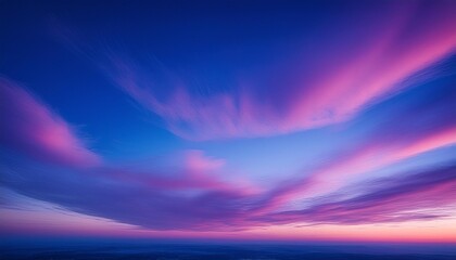 Obraz premium An abstract representation of the sky using gradients of blues, purples, and pinks to evoke a sense of calm and wonder