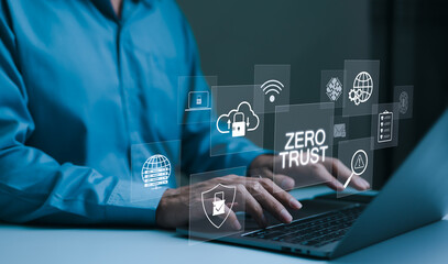 Zero Trust Security Concept. A person types on a laptop with virtual icons zero trust security, cloud protection, business information network security, shields, connectivity, cybersecurity measures,