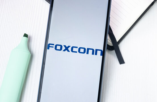 New York, USA - 1 August 2024: Foxconn Hon Hai Precision Industry Logo on Phone Screen, Company Icon on Display