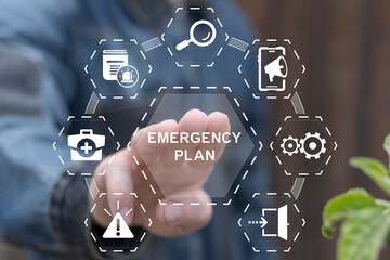Businessman touching EMERGENCY PLAN text button to learn and prepare in emergency situation....
