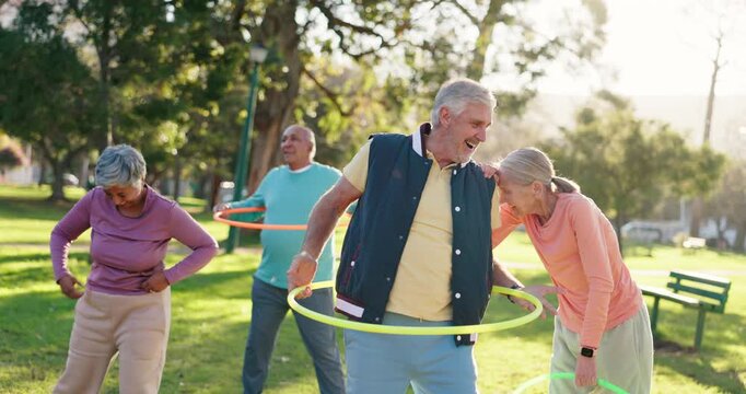 Senior people, exercise and park with hoop for class, fun workout or elderly care in outdoor fitness. Happy or mature group talking with toy for movement, balance or funny activity together in nature
