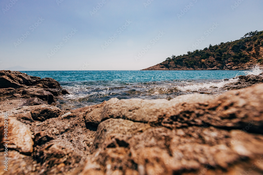 Wall mural a blue transparent sea in the mountains