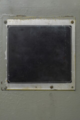 Obraz premium Copy space on an old worn metal black industrial sign.