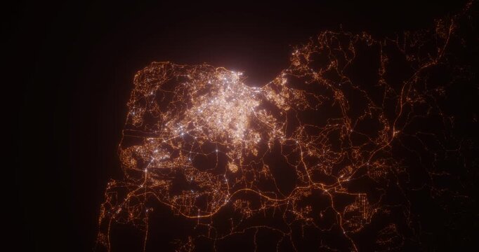 Tangier (Morocco) aerial view at night. Satellite view on modern city with street lights. Camera is flying above the city, moving forward