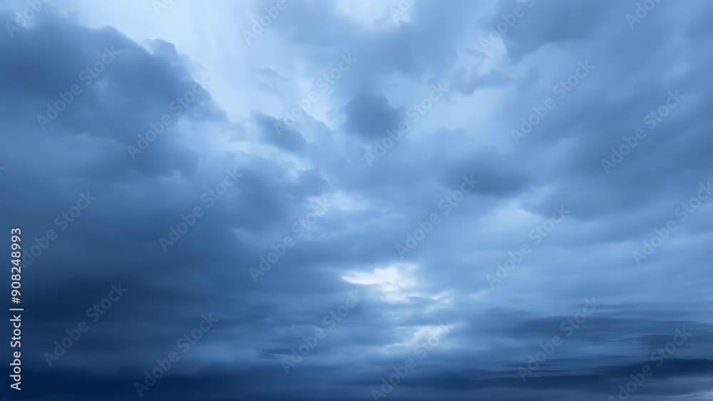 Wall mural a gradual transition from clear skies to a dark stormy atmosphere as the clouds multiply.