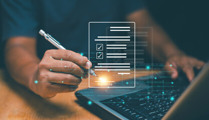 Digital document management technology. Online signing with application. Electronic signature, E-signing, Businessman use a pen to signing e document on virtual screen. Paperless office concept.