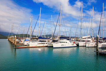 Abell Point Marina in Airlie Beach on the coast of Queensland facing the Whitsunday Islands in the Pacific Ocean, Australia