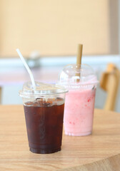 cup of iced coffee on a white table.