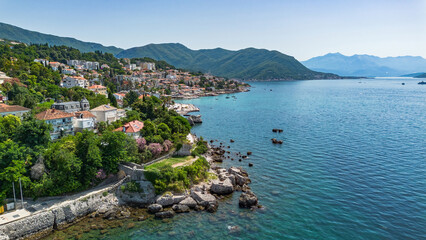 Aerial view of a waterfront residential area in Herceg Novi on the coast of the Adriatic Sea in the Bay of Kotor in Montenegro