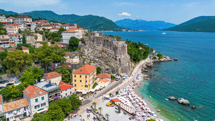 Fototapeta premium Aerial view of the Forte Mare fortress in Herceg Novi, a town in located at the western entrance to the Bay of Kotor on the coast of the Adriatic Sea in Montenegro