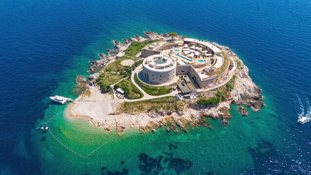 Aerial view of the Lastavica Fortress on Mamula Island at the entrance of the Bay of Kotor in the Adriatic Sea, Montenegro - Ancient concentration camp transformed into a luxury resort