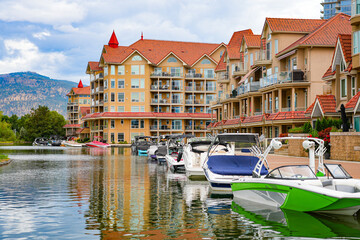 Waterfront apartment buildings with private docks in Kelowna, the third largest city in British...