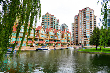 Waterfront apartment buildings with private docks in Kelowna, the third largest city in British...