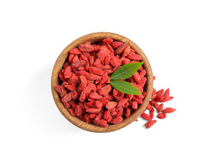 Dried goji berries in bowl and green leaves isolated on white, top view