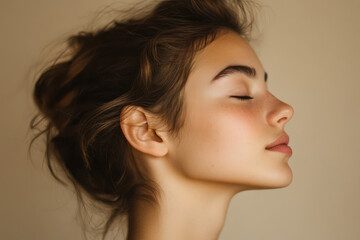 A close up of a girl's face with her eyes closed