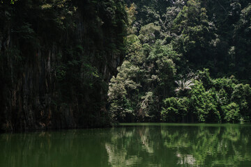 Serenity of a mirrored lake reflecting the surrounding landscape
