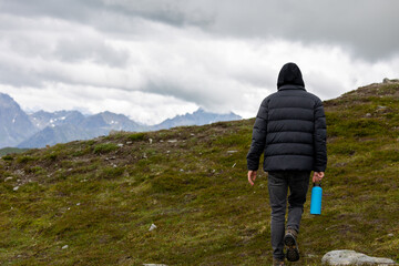 Man Hiking up Hatcher Pass in Palmer Alaska