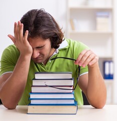 Young male student in the classroom